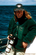 a person that is standing in the water